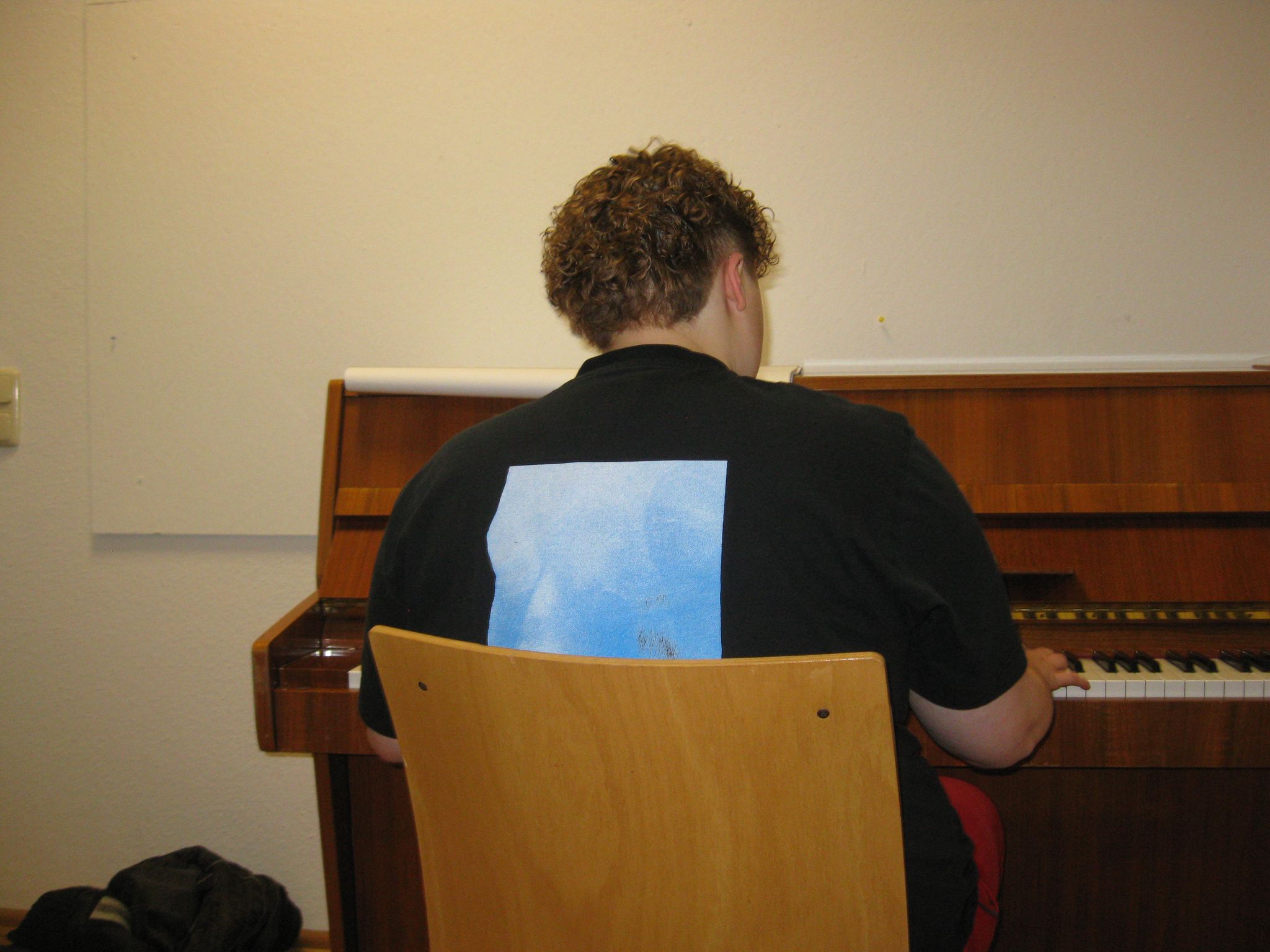 Tata am Klavier